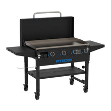 Black Pit Boss gas grill with four burners and side shelves.