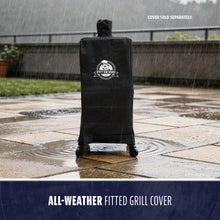 Black all-weather fitted grill cover with Pit Boss logo, shown protecting a grill in heavy rain on a patio.