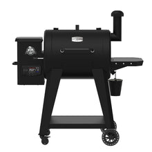 Black Pit Boss pellet grill with digital control panel and smoker box.
