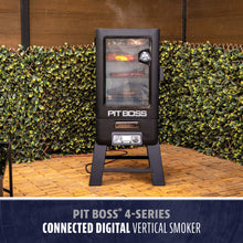Pit Boss 4-Series Connected Digital Vertical Smoker, black, with glass door and digital control panel.