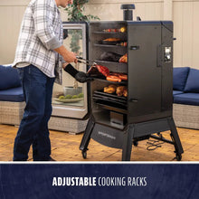 Black outdoor smoker with adjustable cooking racks, filled with assorted meats. Easy-access door and sturdy legs.
