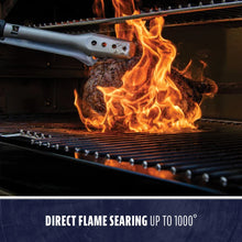 Grill with direct flame searing up to 1000°, showcasing intense fire cooking.