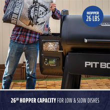 Black Pit Boss pellet grill with 26LB hopper capacity for low & slow cooking.