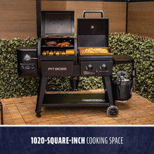 Black Pit Boss grill with 1020-square-inch cooking space, outdoor setup.