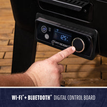 Pit Boss digital control board with Wi-Fi and Bluetooth, temperature set to 125°F, large dial and display.