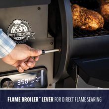 Pit Boss grill with flame broiler lever for direct flame searing.