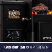 Black Pit Boss smoker with flame broiler lever for direct flame searing.