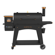 Black Pit Boss Austin XL pellet grill with digital display and smoker box.