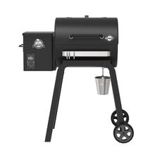 Black Pit Boss Carbon pellet grill with digital control panel and grease bucket.