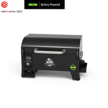 Compact black Pit Boss pellet grill, battery powered, digital display, stainless handle, Red Dot Award 2023 winner.