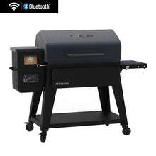 Pit Boss pellet grill with Bluetooth and Wi-Fi, black finish, side shelf, digital control panel, and caster wheels.