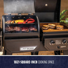 Pit Boss grill with 1021-square-inch cooking space, smoking and grilling food.