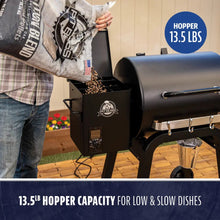 Black Pit Boss smoker with 13.5 lb hopper capacity for low & slow cooking.