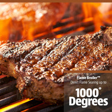 Flame Broiler™ searing steak on grill with up to 1000° direct flame.