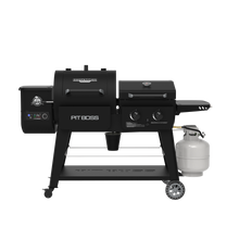 Black Pit Boss Competition Series grill with dual burners and propane tank.