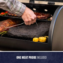 Black electric smoker with one meat probe included.
