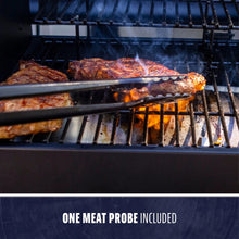 Grill with steaks cooking over flames, tongs holding meat. Text: "One meat probe included."
