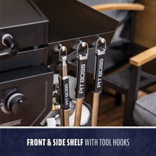 "Black grill with front and side shelf tool hooks labeled 'PIT BOSS'."
