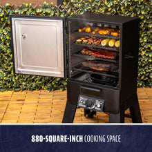 Vertical black smoker with open door, showing multiple racks of food. Features 880-square-inch cooking space.