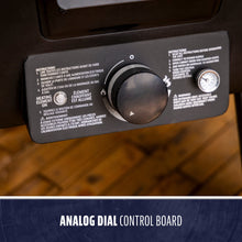 Black analog dial control board with temperature gauge and labeled instructions, designed for easy outdoor appliance opera...