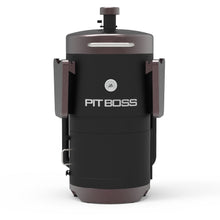 Black Pit Boss portable charcoal grill with folding side tables.