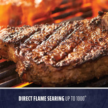 Grilled steak with charred surface, direct flame searing up to 1000°F.