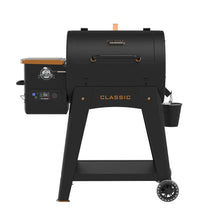 Black Pit Boss Classic pellet grill with digital control panel and side shelf.
