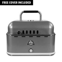 Compact silver Pit Boss portable grill with handle, front vents, and free cover included. Ideal for outdoor cooking.