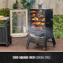 Copperhead smoker with 1300-square-inch cooking space, filled with vegetables and meats.